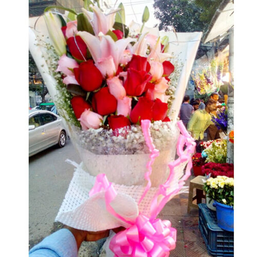 colorful roses with lily gypsy hand bouquet