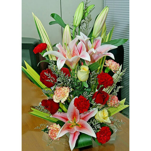 muddy flower vase with roses lily carnation limo