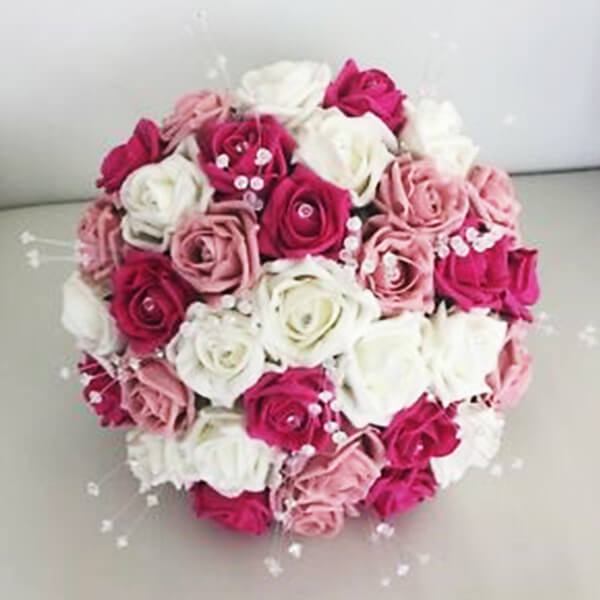 outstanding bouquet of white red soft pink colored roses decorated with pearl love