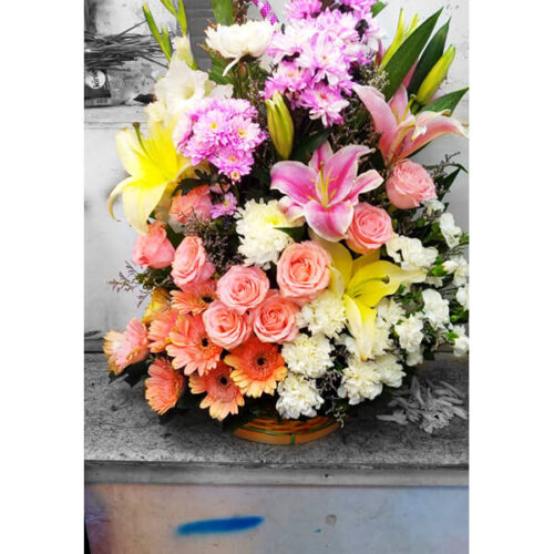 combination of lily rose carnation gerbera limo flower basket