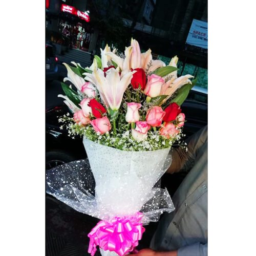 hand bouquet of shaded colorful roses lily gypsy limo