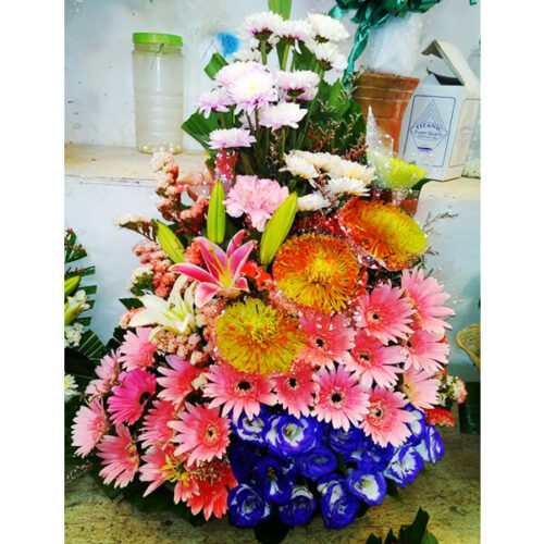 outstanding basket of mums spiders lilyes statics eustoma gerbera with decoration