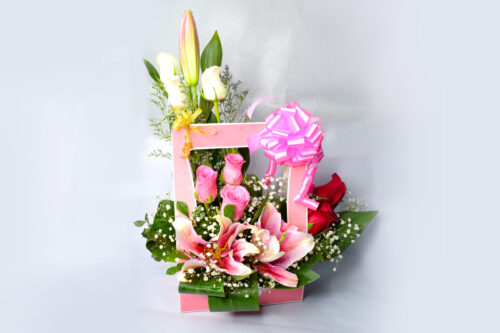 pink gypsy basket of multicolor roses with lillies 02