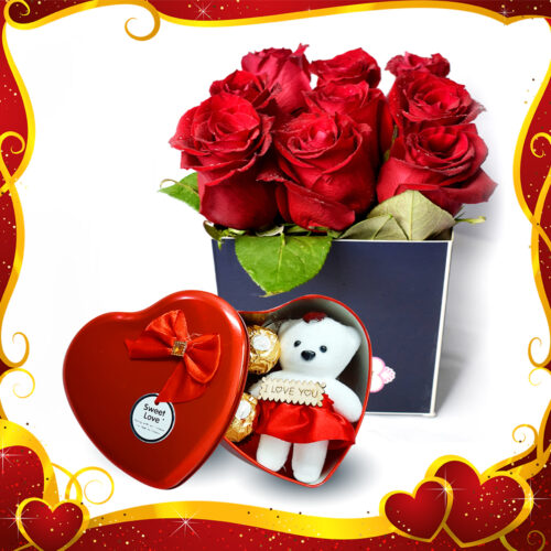 romantic box of blooming red roses with love chocolates box and teddy bear